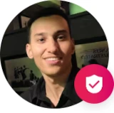Magnifying glass icon to view the Airbnb mice host(Ali) profile image